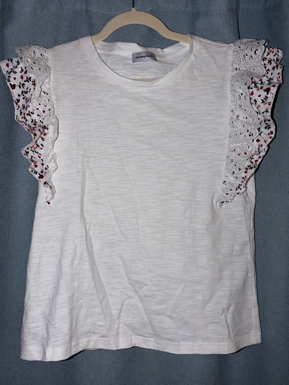 Charming Charlies Ruffle sleeve floral & eyelet lace top.